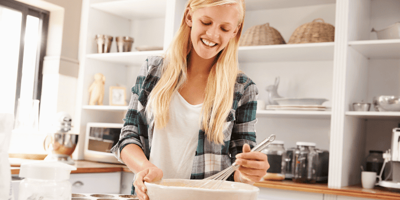 Girl cooking in kitchen